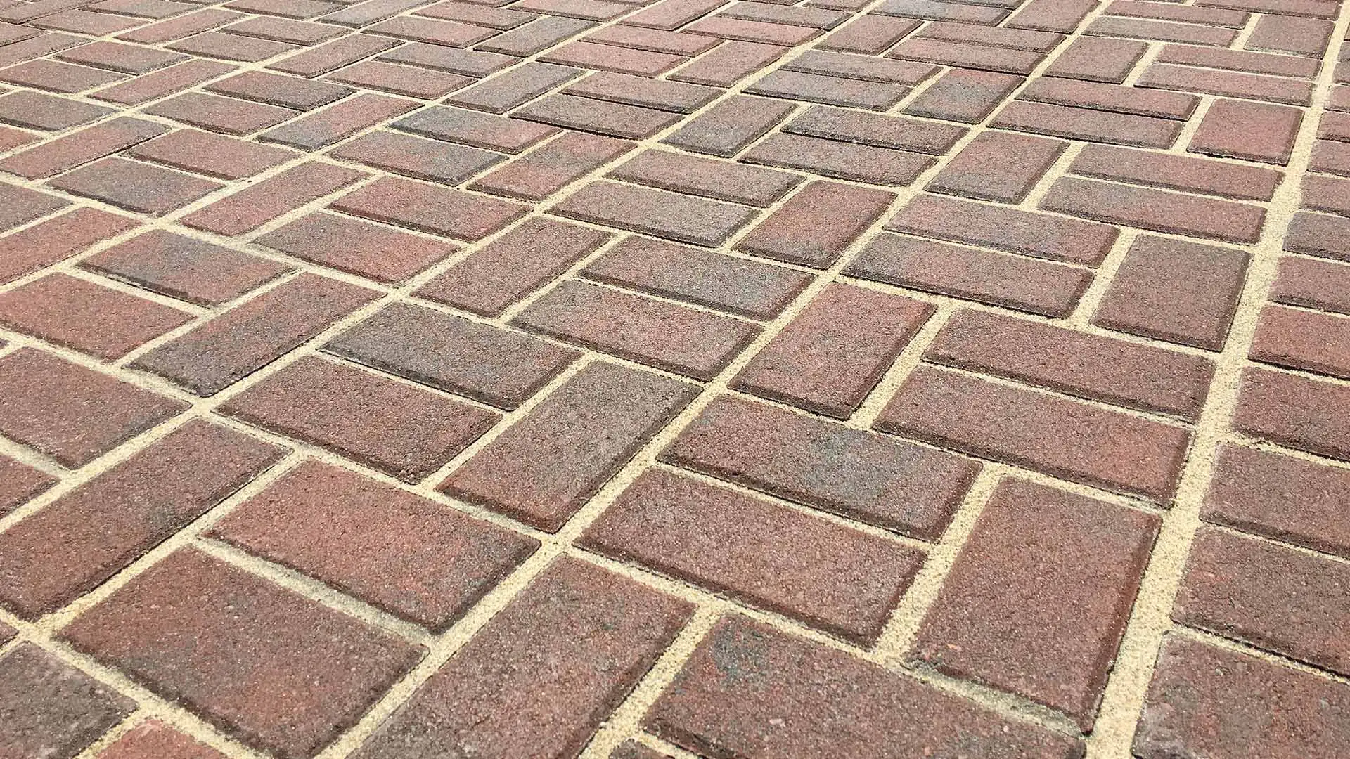 Red brick pavers up close at a home in Naples, FL.