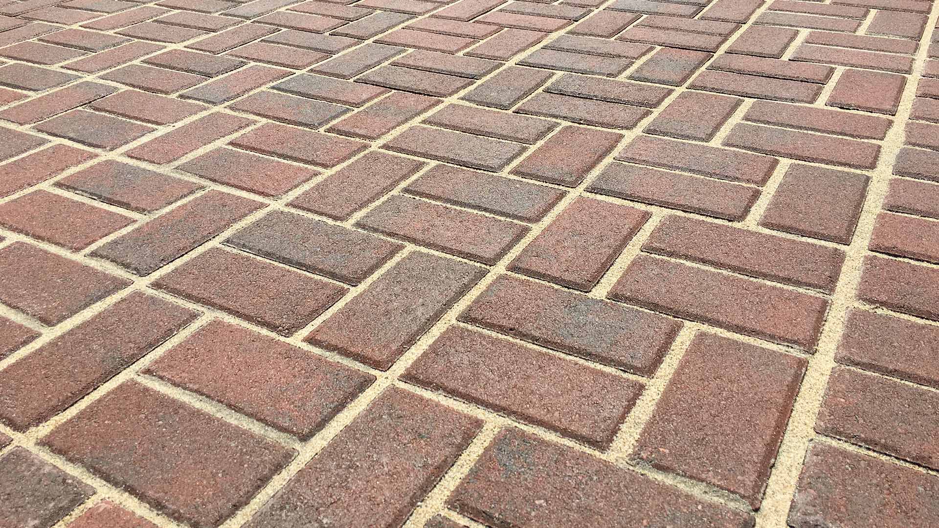 Red brick pavers up close at a home in Naples, FL.